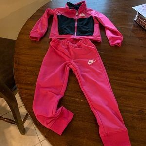 SOLD ON MERCARI Pink Nike jump suit 3T